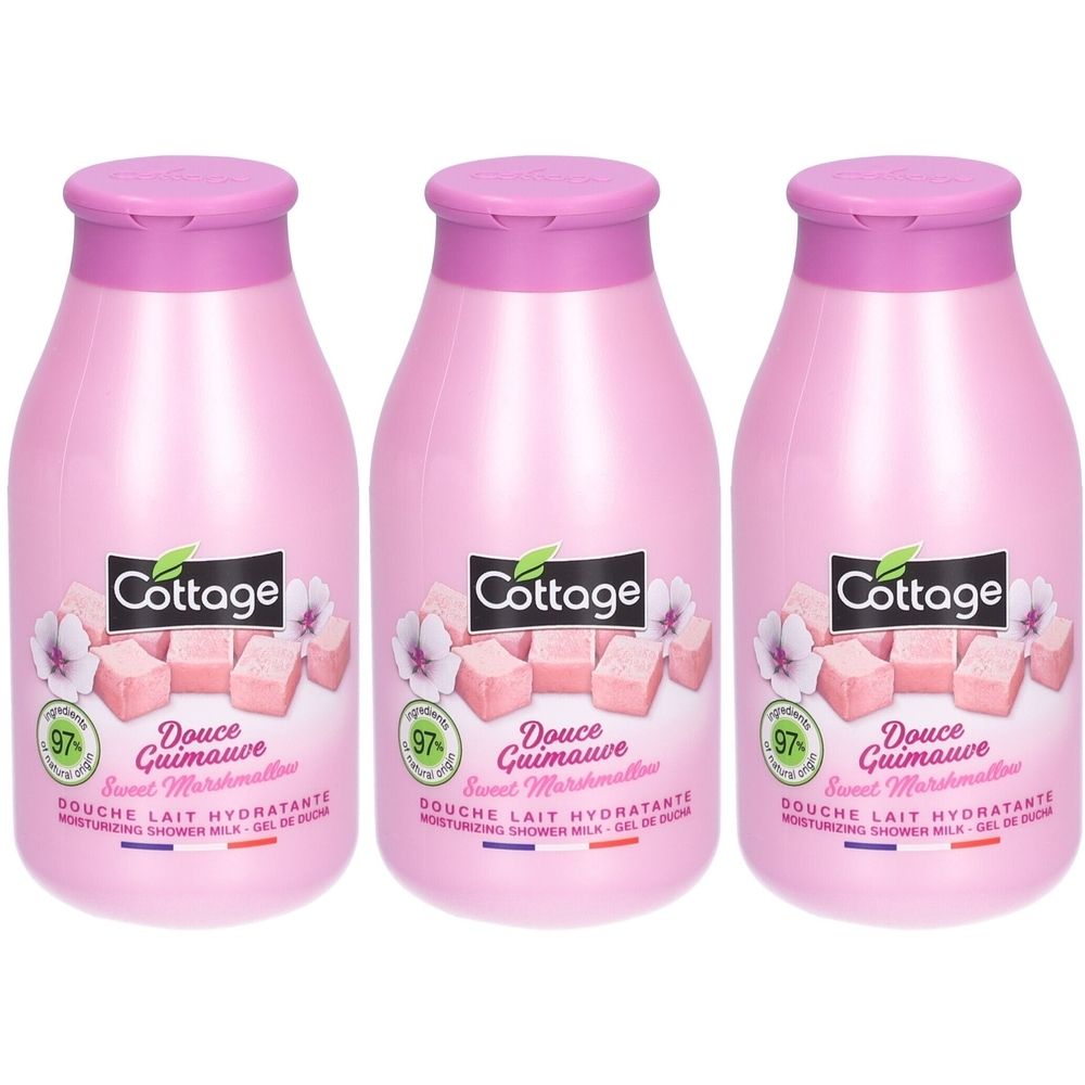 Drei rosa Flaschen. Auf jeder Flasche steht "Cottage Douche Lait Hydratante Douce Guimauve".