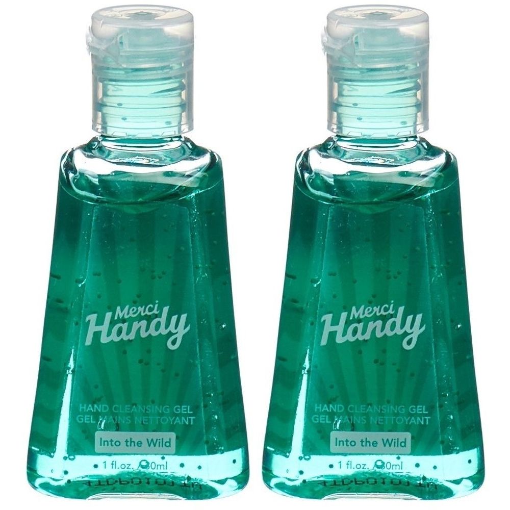 Deux flacons de gel nettoyant pour les mains. Inscription : Merci Handy, Into the Wild. Liquide vert clair dans des flacons transparents avec bouchon rabattable.