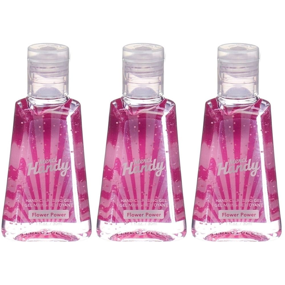 Trois flacons de gel pour les mains roses. Inscription "Merci Handy Flower Power". Bouchon transparent.