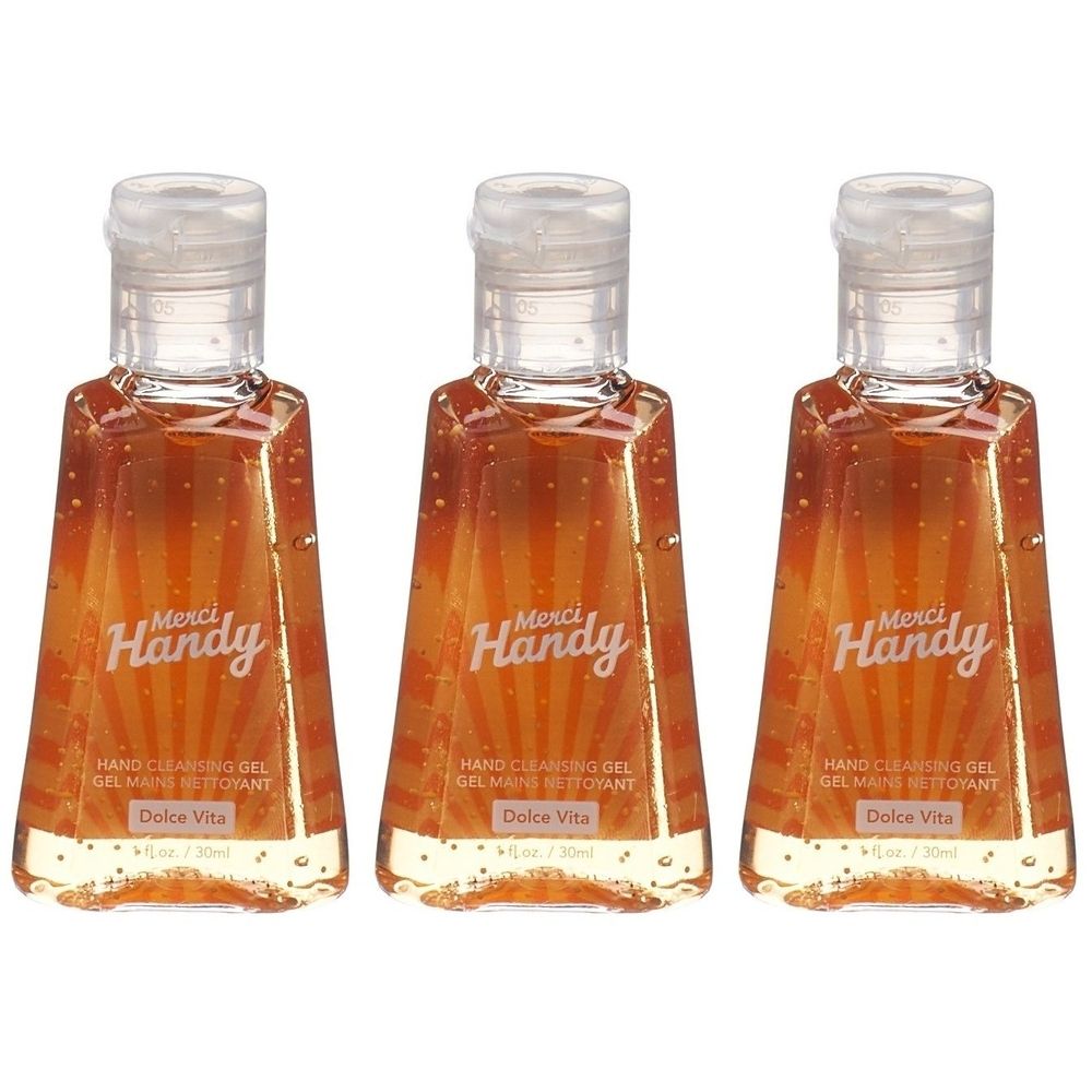 Drei Flaschen Handgel mit Klappverschluss. Aufschrift "Merci Handy", "Hand Cleansing Gel Dolce Vita".
