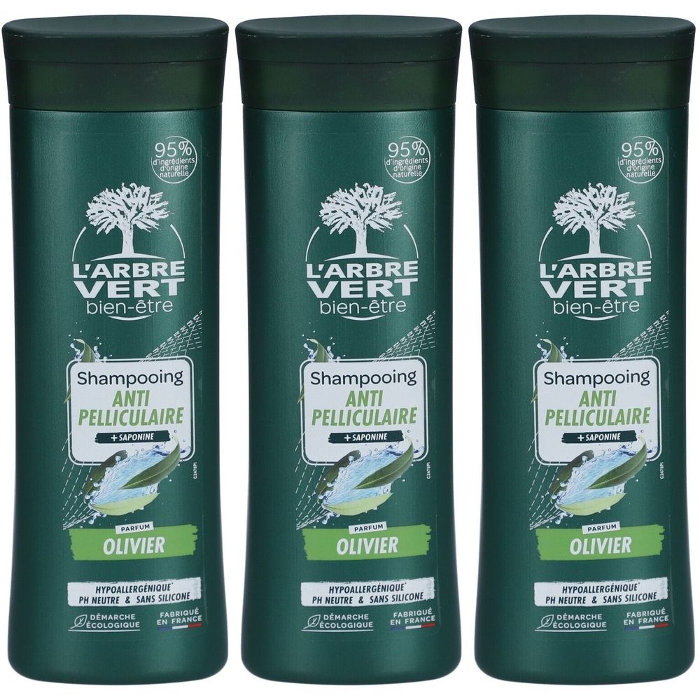 Drei grüne Shampoo-Flaschen. Aufschrift: L'ARBRE VERT bien-être, Shampooing Anti-Pelliculaire, OLIVIER. 95% Inhaltsstoffe natürlichen Ursprungs.