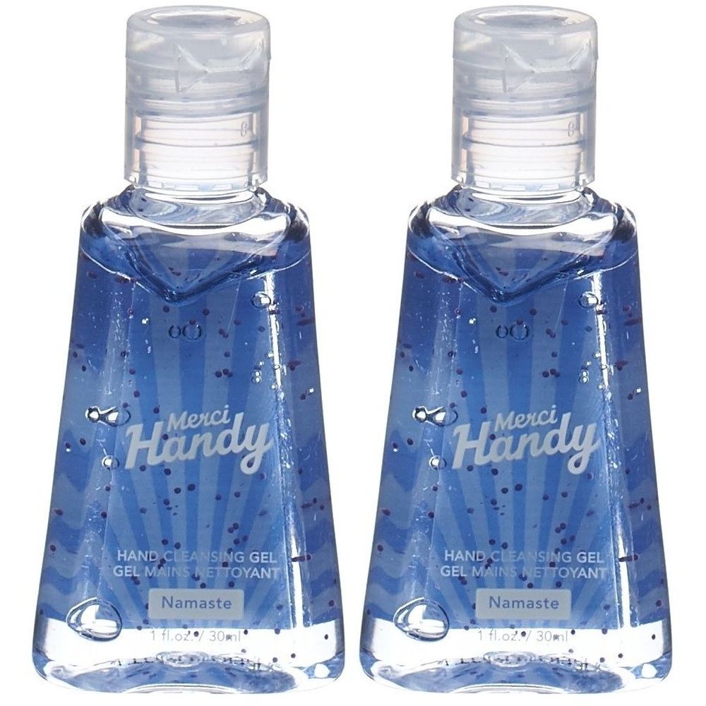 Deux flacons de gel nettoyant pour les mains. Gel bleu pailleté. Inscription : Merci Handy, Namaste. Bouchon transparent.