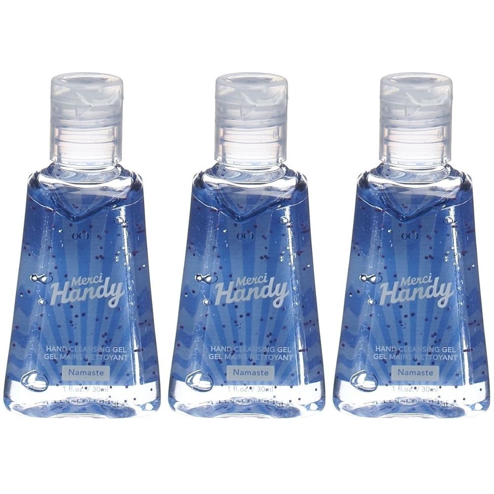 Trois flacons de gel nettoyant pour les mains. Liquide bleu avec paillettes. Inscription "Merci Handy".