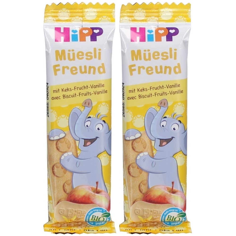 Deux barres de céréales emballées. Inscription : HiPP Müesli Freund avec Biscuit-Fruits-Vanille. Illustration d'un éléphant et d'une pomme.