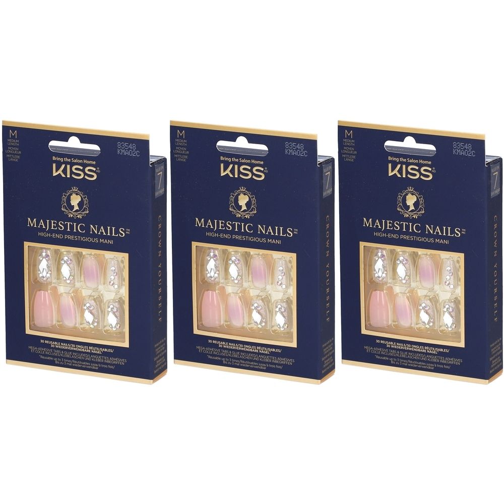 Drei Packungen mit künstlichen Nägeln. Die Verpackung zeigt den Markennamen KISS und den Produktnamen Majestic Nails. Die Nägel sind rosa und klar mit Strasssteinen.