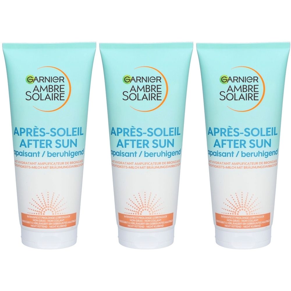 Trois tubes de lait après-soleil. Tubes bleu clair avec base blanche. Inscription : GARNIER AMBRE SOLAIRE, APRÈS-SOLEIL AFTER SUN, apaisant.