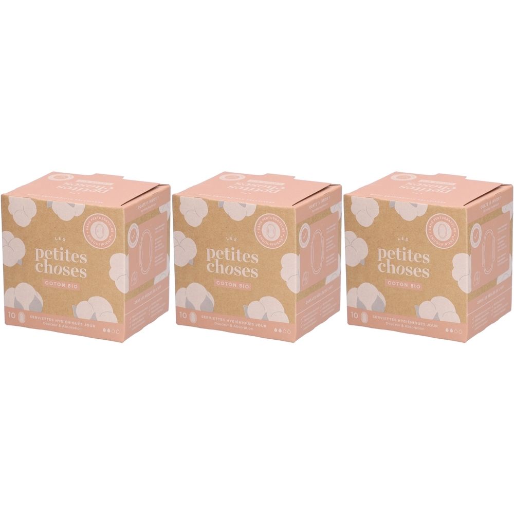 Drei quadratische Kartons mit rosa und brauner Verpackung. Aufschrift: LES PETITES CHOSES, Damenbinden aus Bio-Baumwolle.