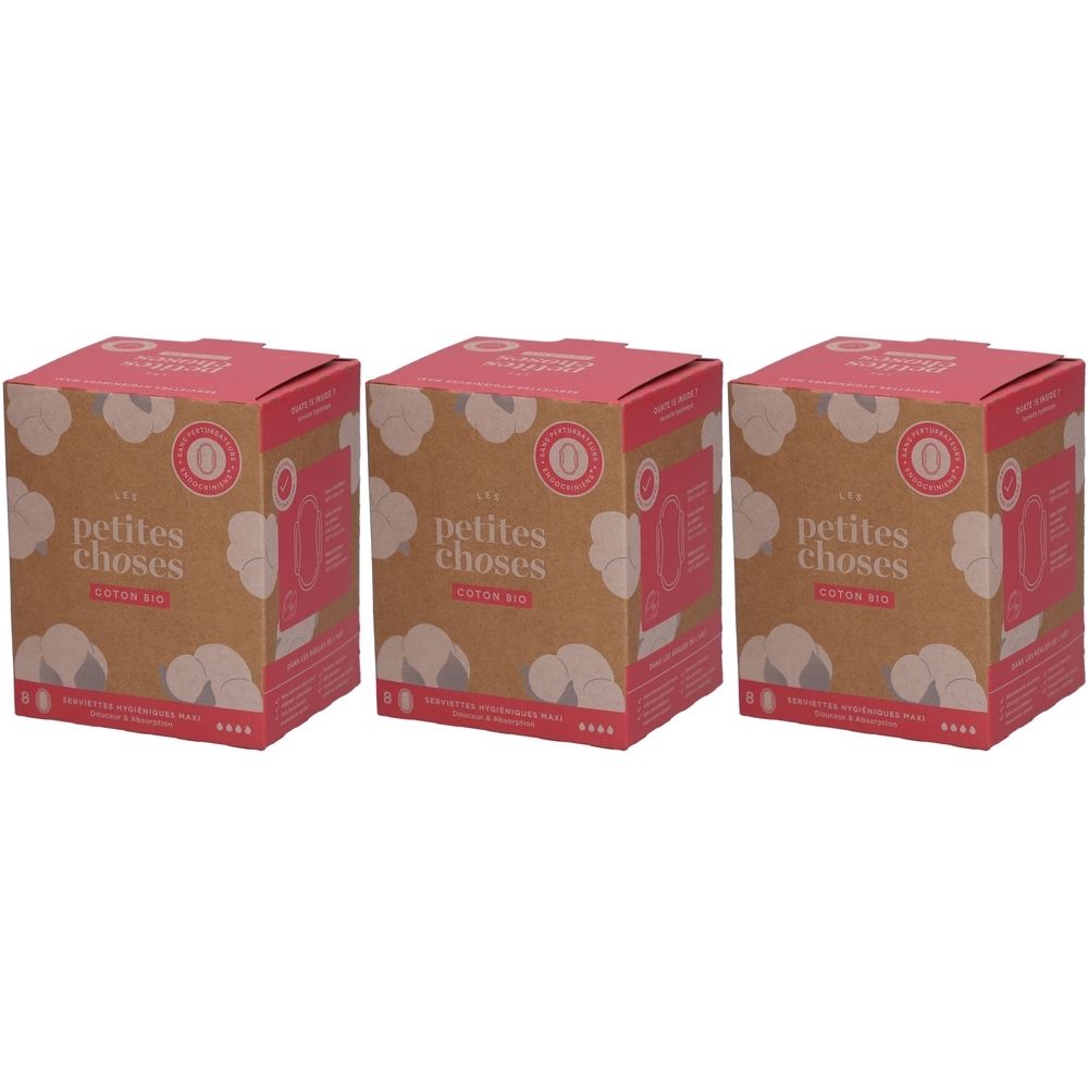 Drei Kartons mit Damenbinden aus Bio-Baumwolle. Aufdruck: „les petites choses coton bio“. Rosa Deckel, braune Seiten.