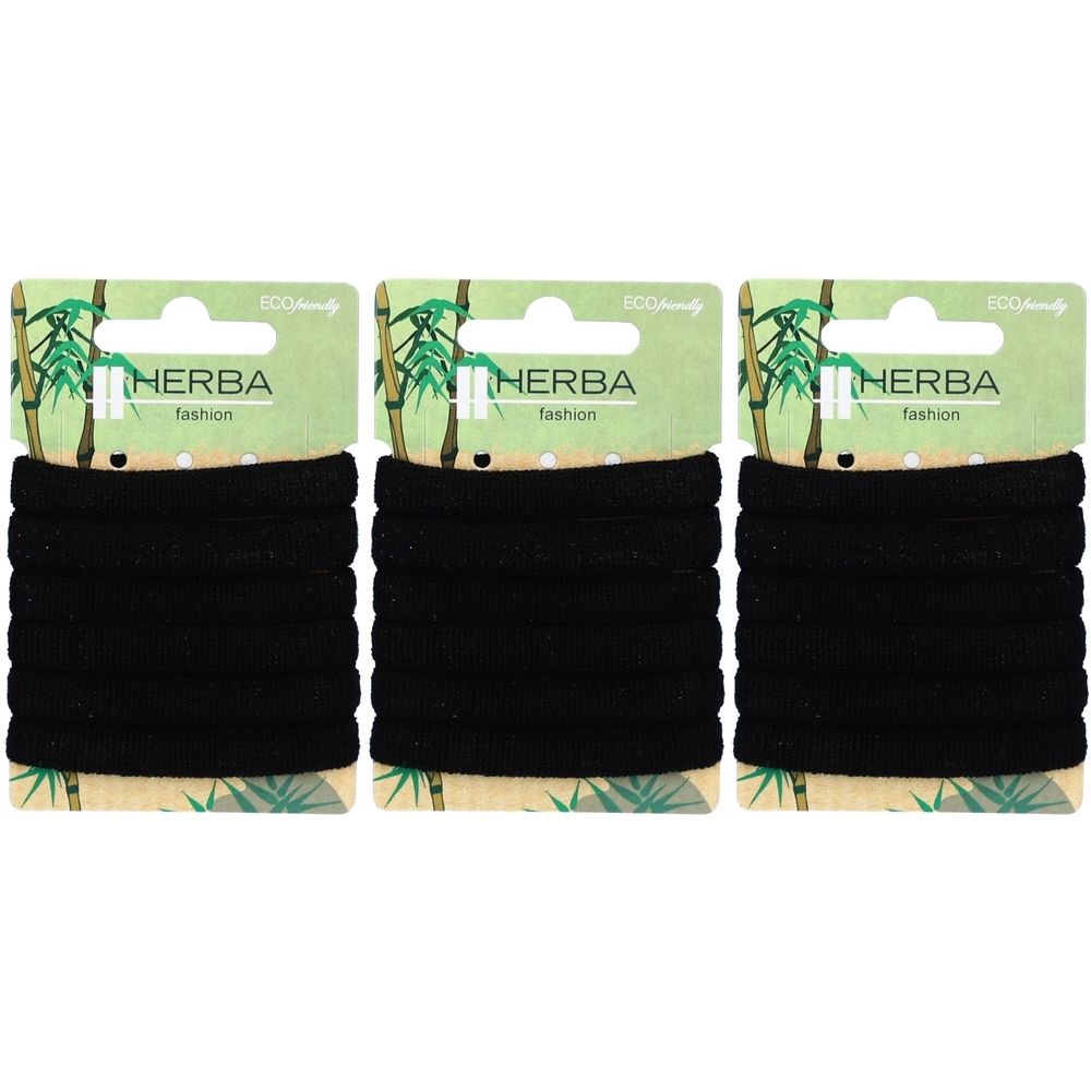 Drei Packungen schwarzer Haargummis. Jede Packung mit HERBA-Logo und Bambus-Design. Eco-Friendly-Label.
