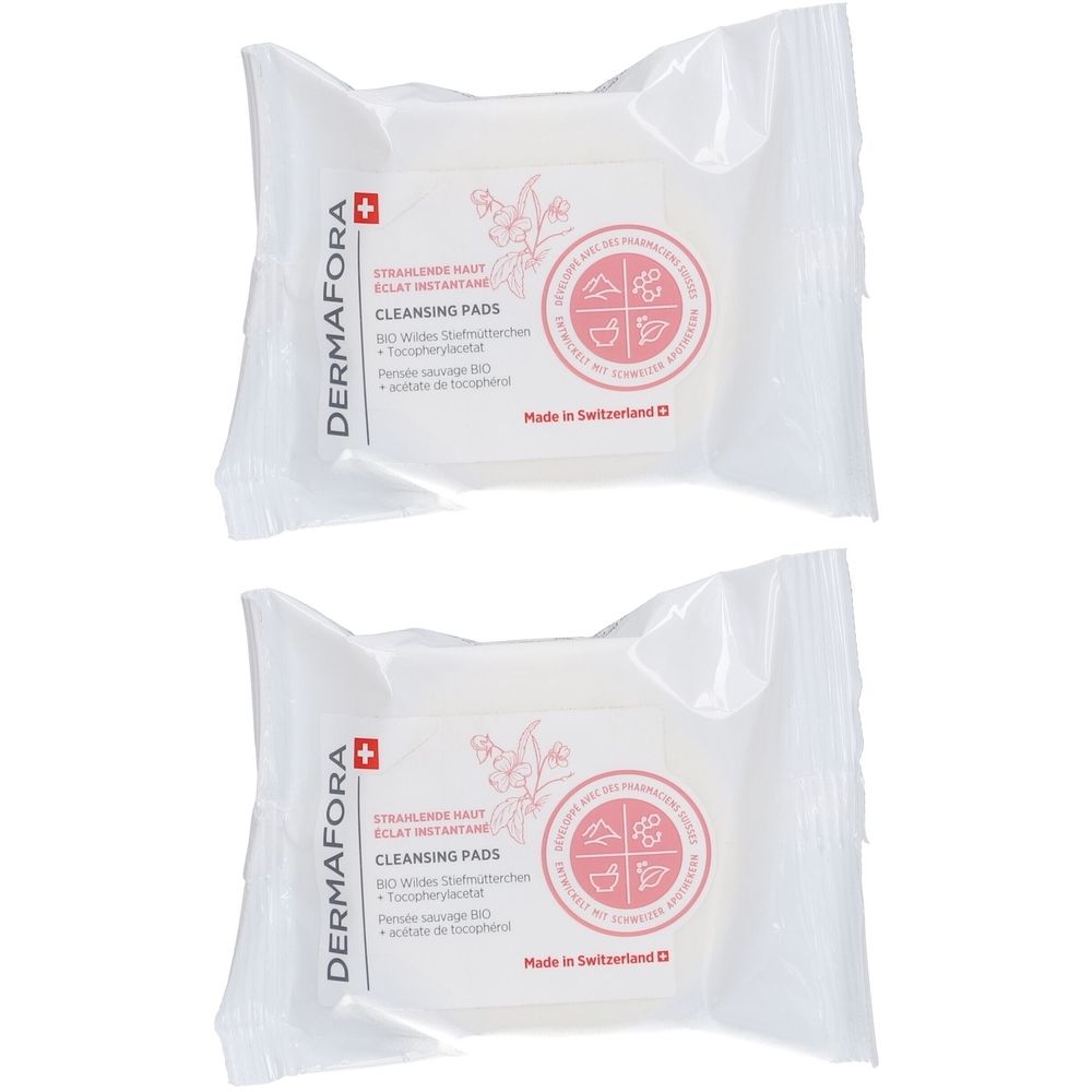 Deux pads nettoyants emballés individuellement. Inscription : DERMAFORA, Cleansing Pads. Avec croix suisse et logo. Fabriqué en Suisse.