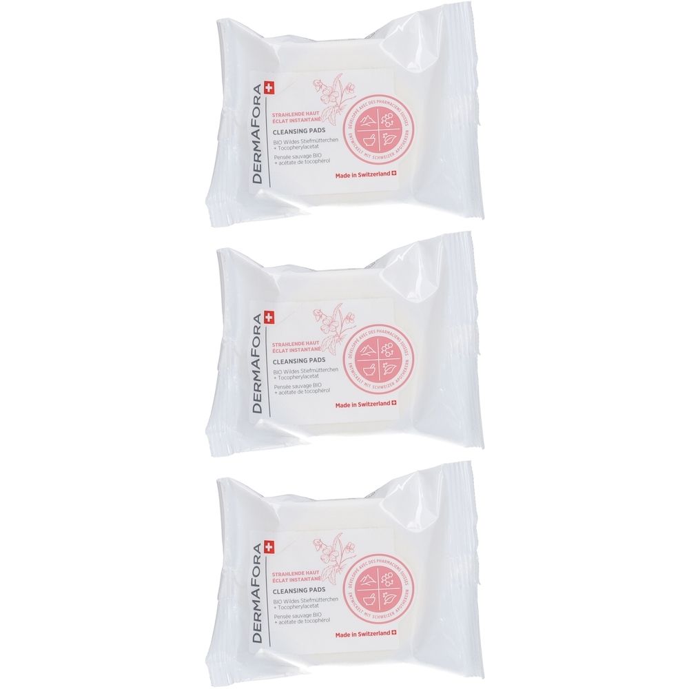 Trois pads nettoyants emballés. Pads blancs dans des sachets en film transparent. Impression avec logo et informations produit.