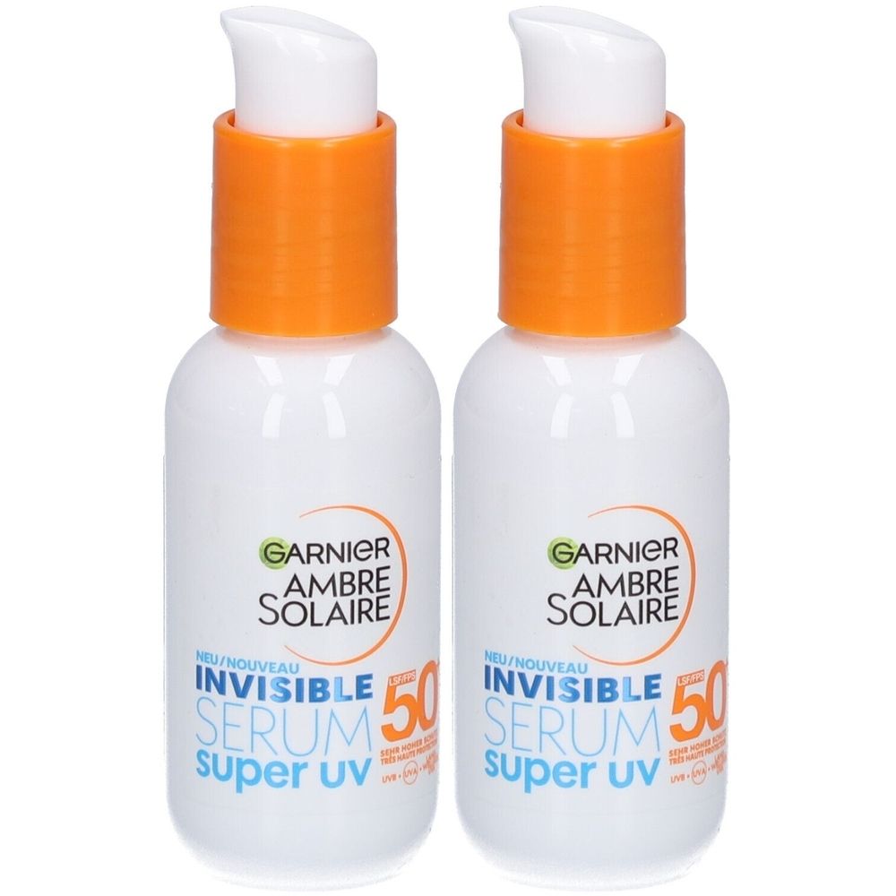 Deux flacons blancs avec bouchons orange. Inscription: Garnier Ambre Solaire, Invisible Serum, Super UV, facteur de protection 50.