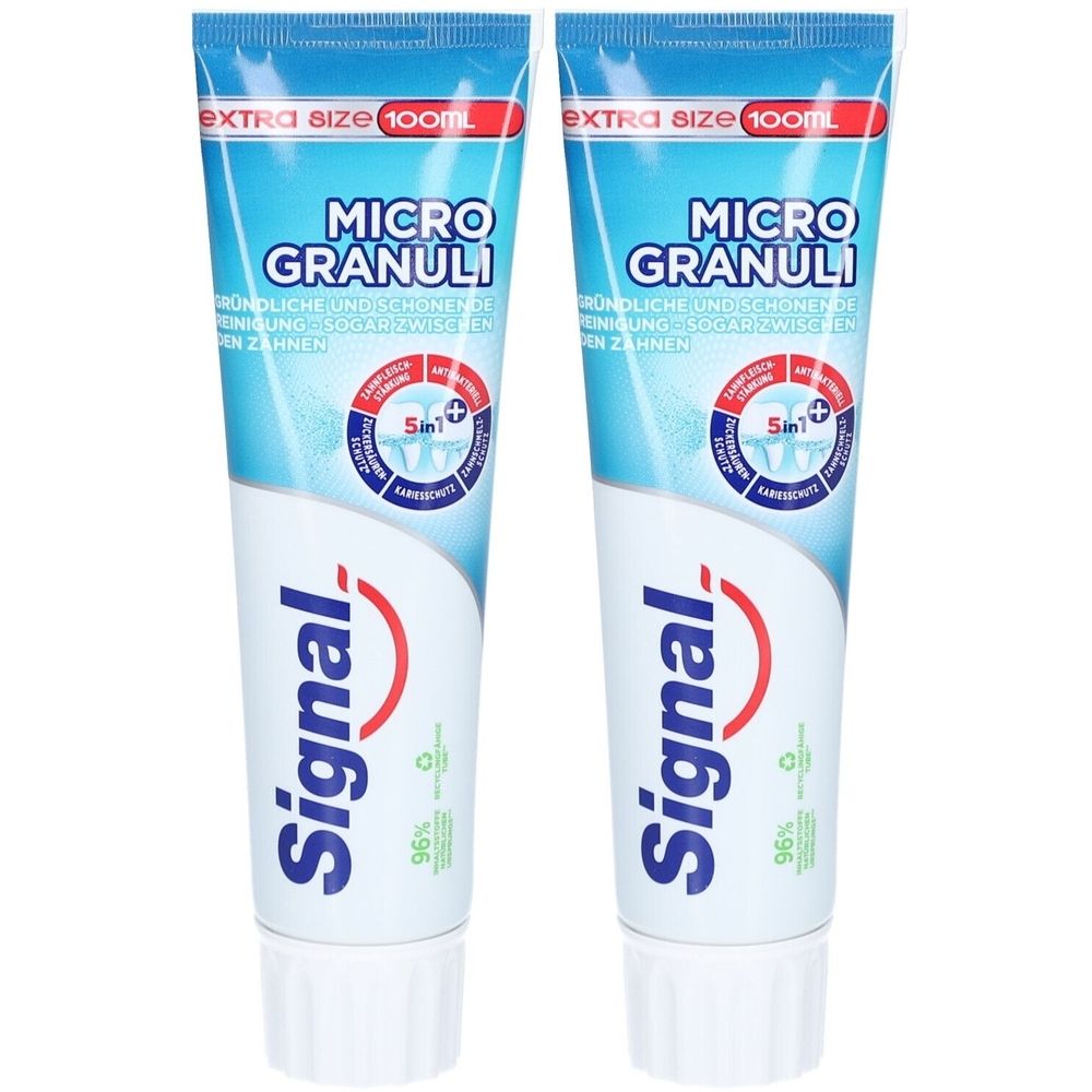 Deux tubes de dentifrice Signal Micro Granuli. Emballage bleu et blanc. Inscription : Extra Size 100ml, 5in1.