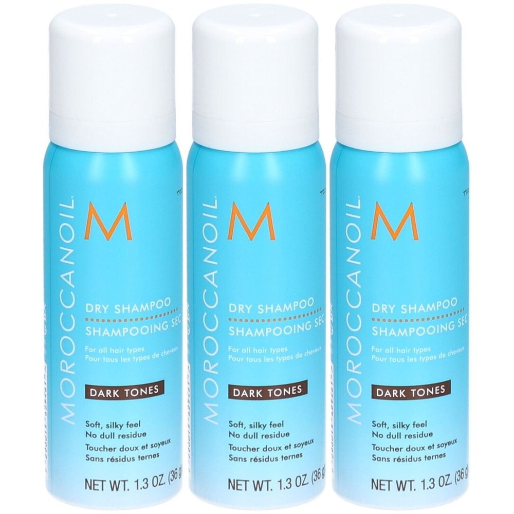 Trois flacons bleus de shampooing sec Moroccanoil pour cheveux foncés. Inscription: "DARK TONES". Poids net: 1,3 oz (36 g).