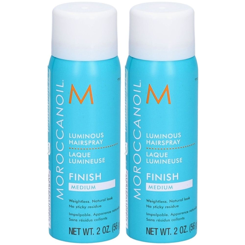 Deux flacons de MOROCCANOIL Luminous Hairspray. Flacons bleus turquoise avec bouchons blancs. Inscription : Luminous Hairspray, Finish Medium. Poids net : 2 oz (56 g).