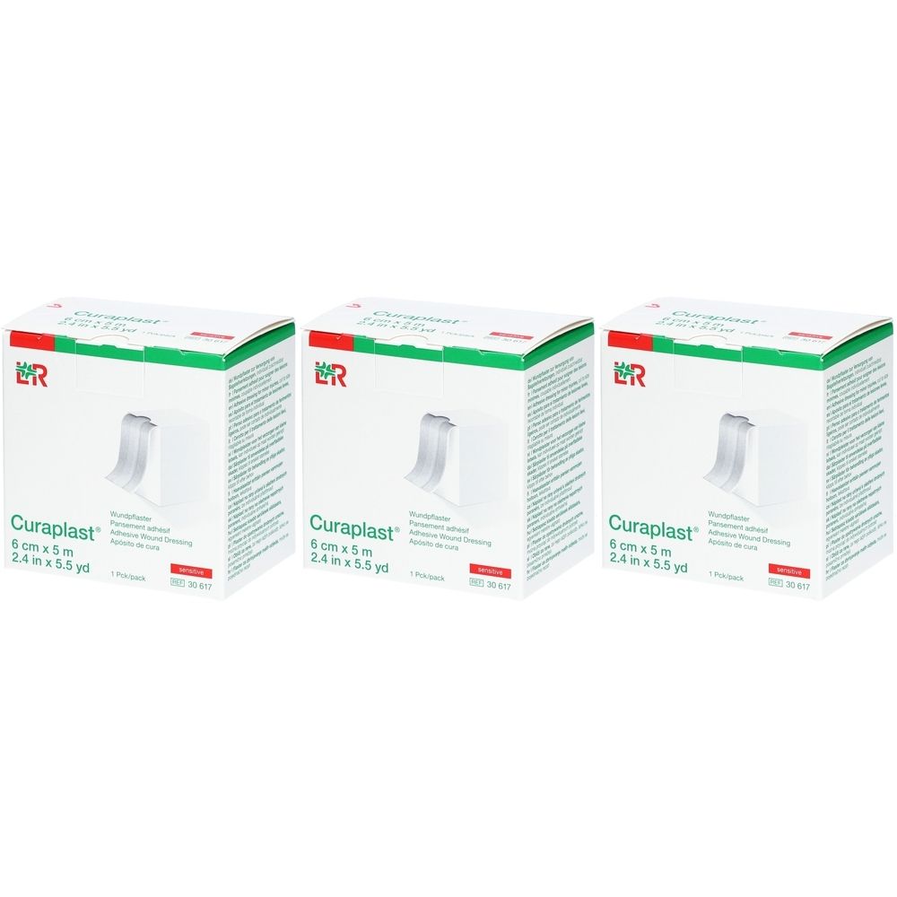 Drei weiße Kartons mit grünem Deckel. Aufdruck: Curaplast, 6 cm x 5 m. Sichtbar: Wundschnellverband.