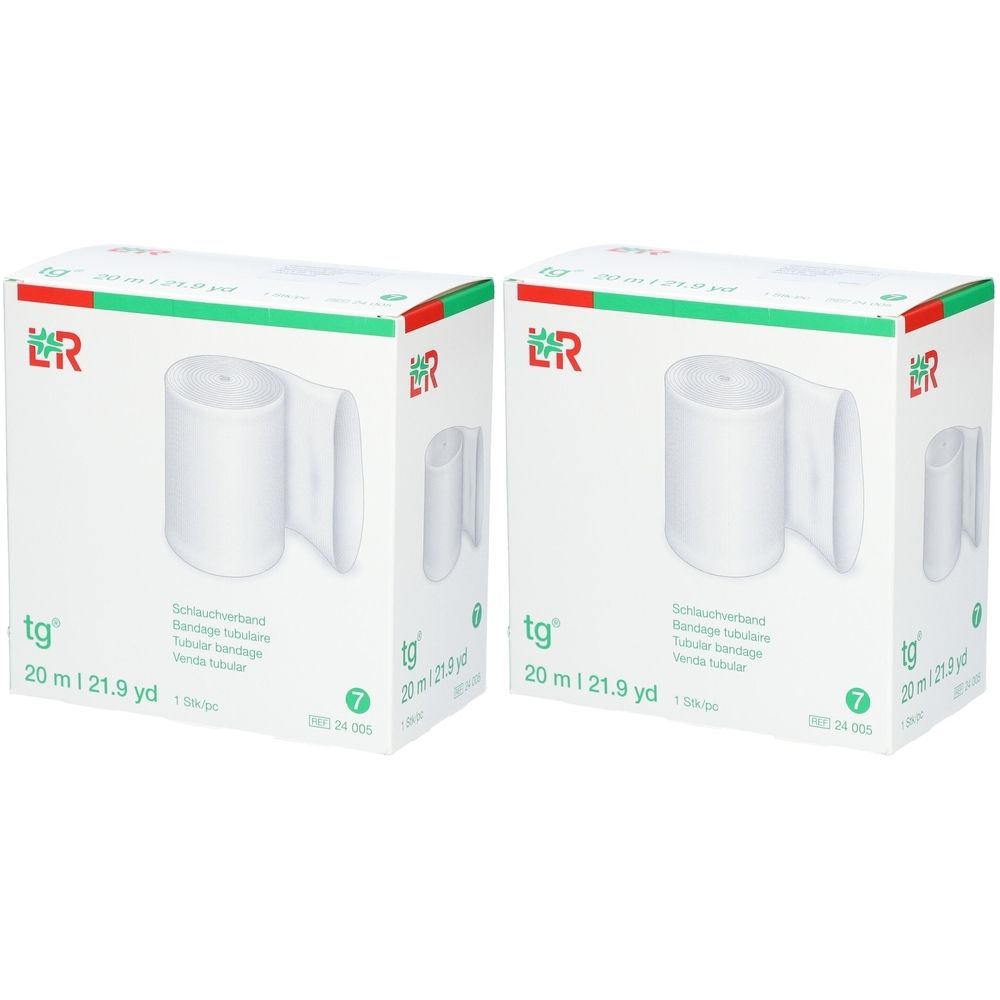Zwei Kartons mit weißem Schlauchverband. Aufdruck: tg, 20 m, 21.9 yd. Grün-rotes Logo. Produktname in Deutsch, Englisch, Französisch und Spanisch.