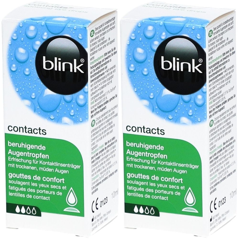 Zwei Kartons mit "blink"-Logo und Text. Aufschrift: "contacts", "beruhigende Augentropfen". Grün-weiße Verpackung mit Wassertropfen-Design.
