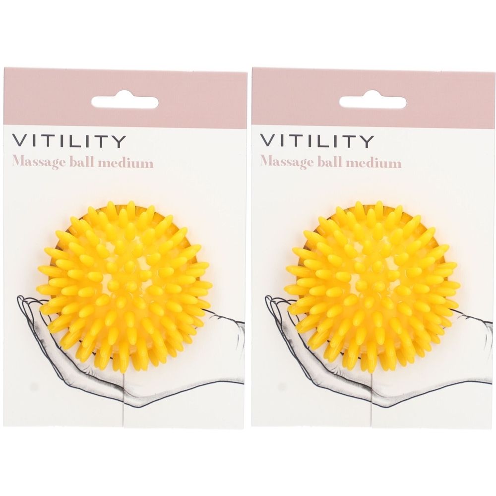 Gelbe Massagekugel mit Noppen, in Verpackung. Marke VITILITY, Aufschrift "Massage ball medium".