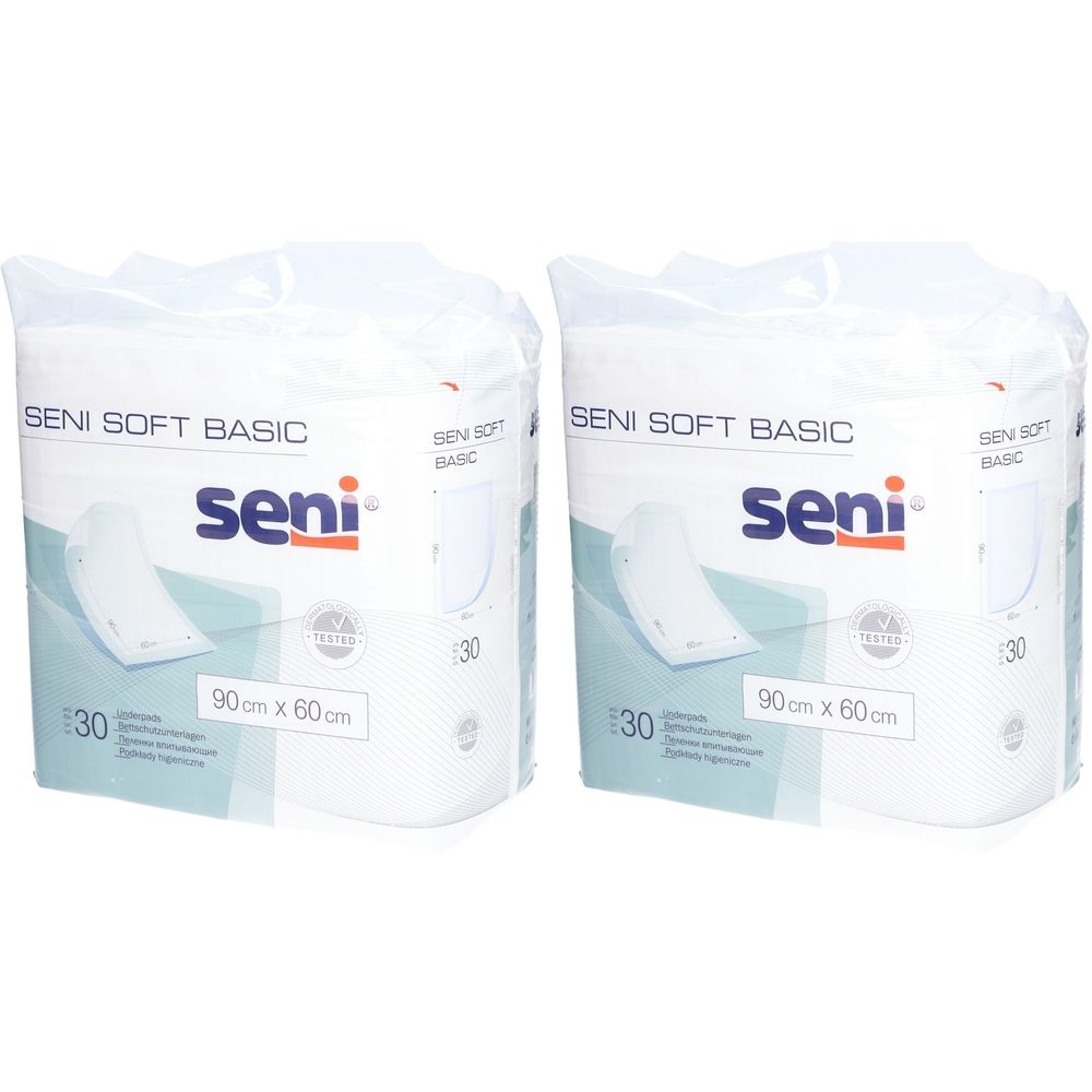 Deux paquets de protections SENI Soft Basic. Chaque paquet contient 30 unités. Dimensions : 90 cm x 60 cm. Marque SENI.