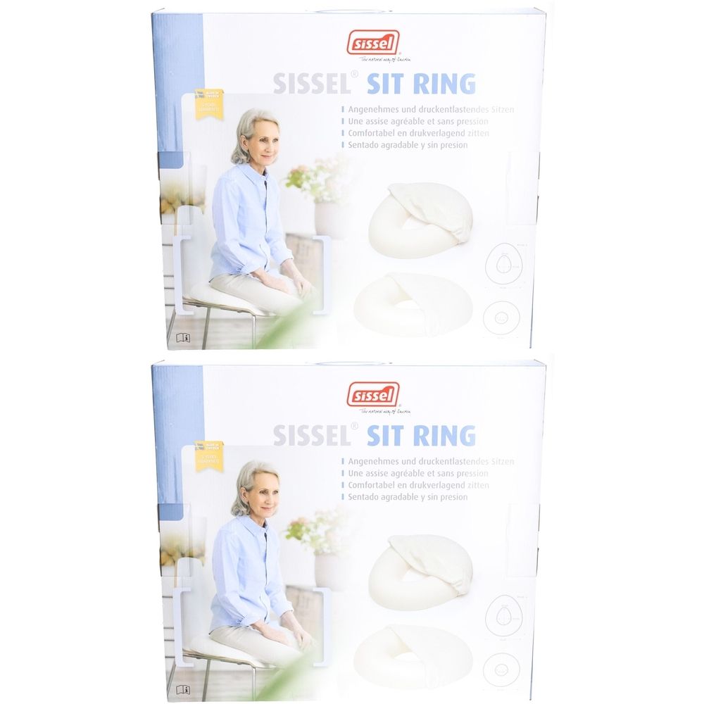 Zwei Produktverpackungen mit dem Titel Sissel SIT RING. Auf jeder Verpackung ist eine Frau abgebildet, die auf einem Ring sitzt.