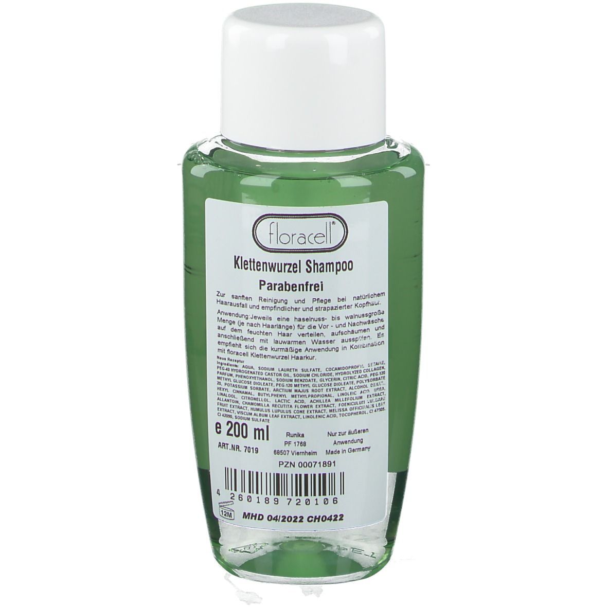 Flacon de shampooing à la racine de bardane. Dos avec texte et ingrédients. Bouchon blanc, liquide vert.