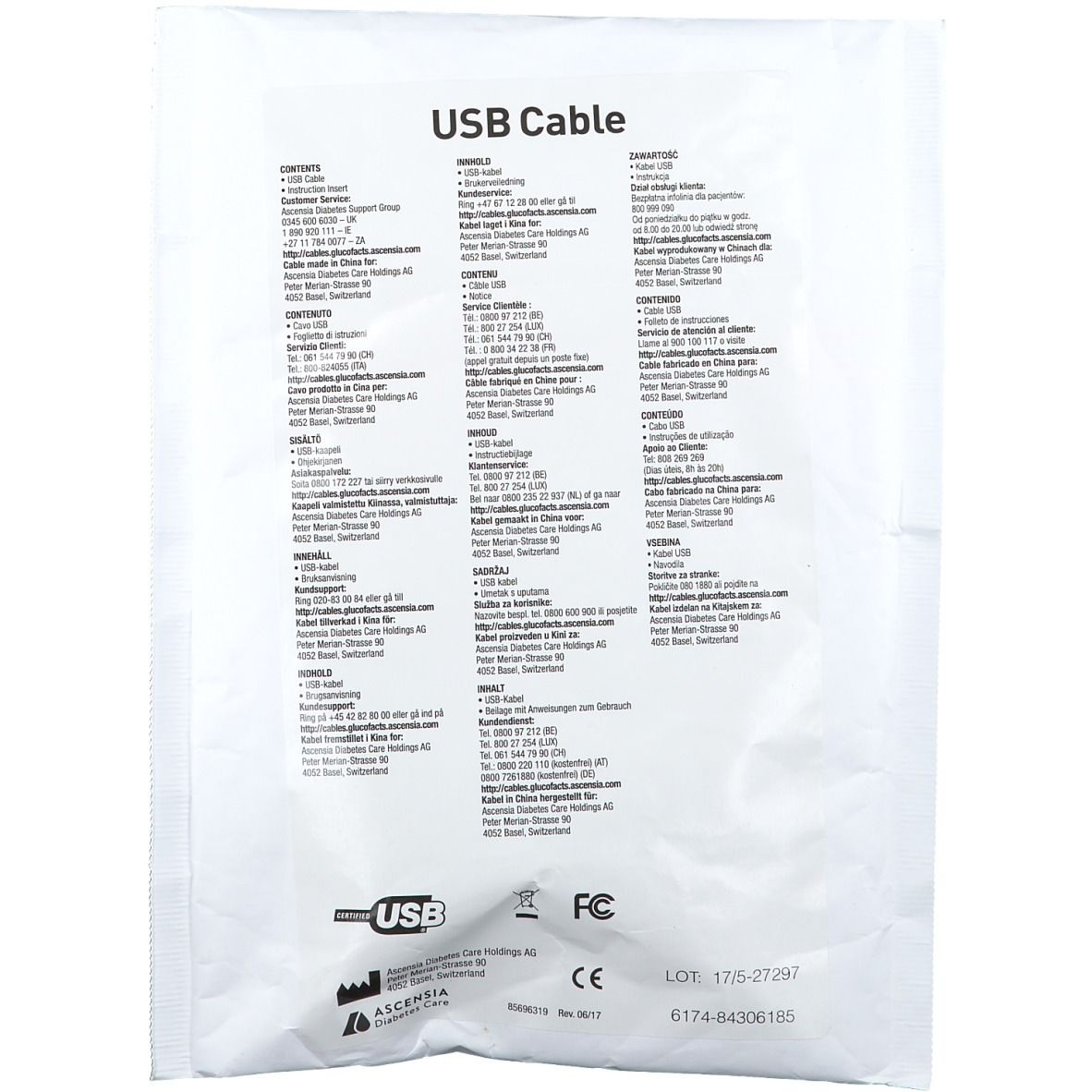 Emballage de câble USB. Inscription "USB Cable". Logos: USB, FC, CE. Texte en plusieurs langues.