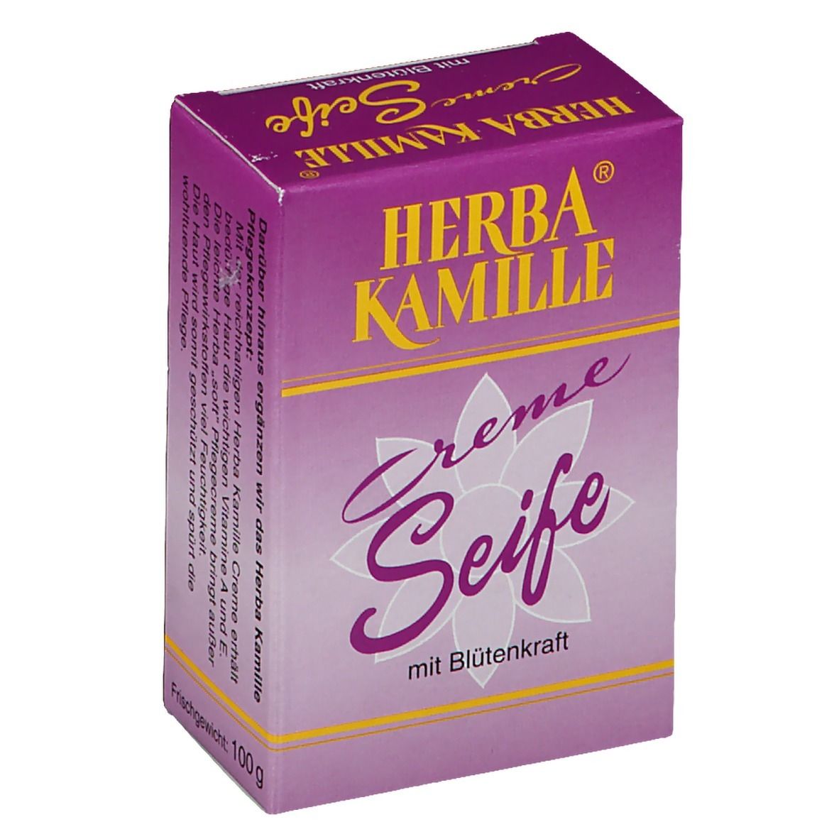 Savon Herba Kamille Crème dans un emballage violet. Inscription jaune. Motif floral. Poids net : 100g.