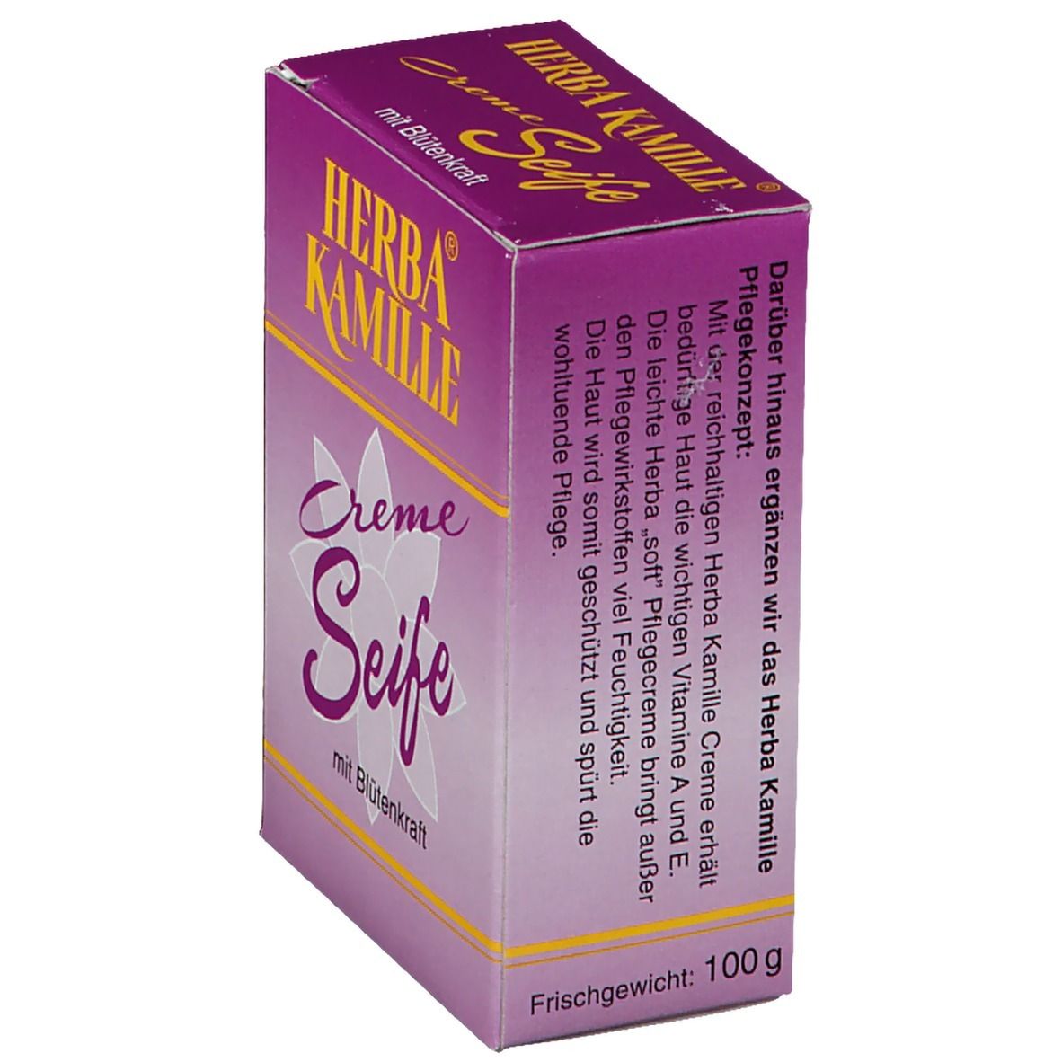 Savon Herba Kamille Crème dans un emballage violet. Inscription jaune. Motif floral. Poids net : 100g. Vue latérale.