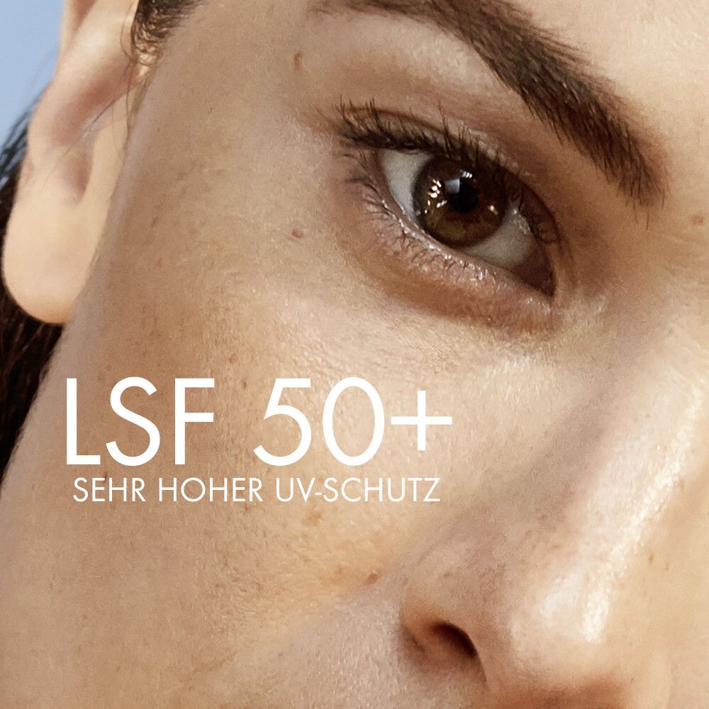 Nahaufnahme eines Auges und Haut. Text: LSF 50+ Sehr hoher UV-Schutz.