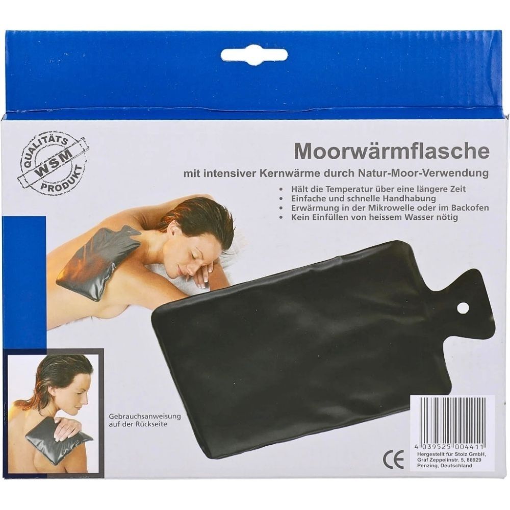Emballage d'une bouillotte à tourbe avec chaleur interne naturelle. Bouillotte noire avec poignée.