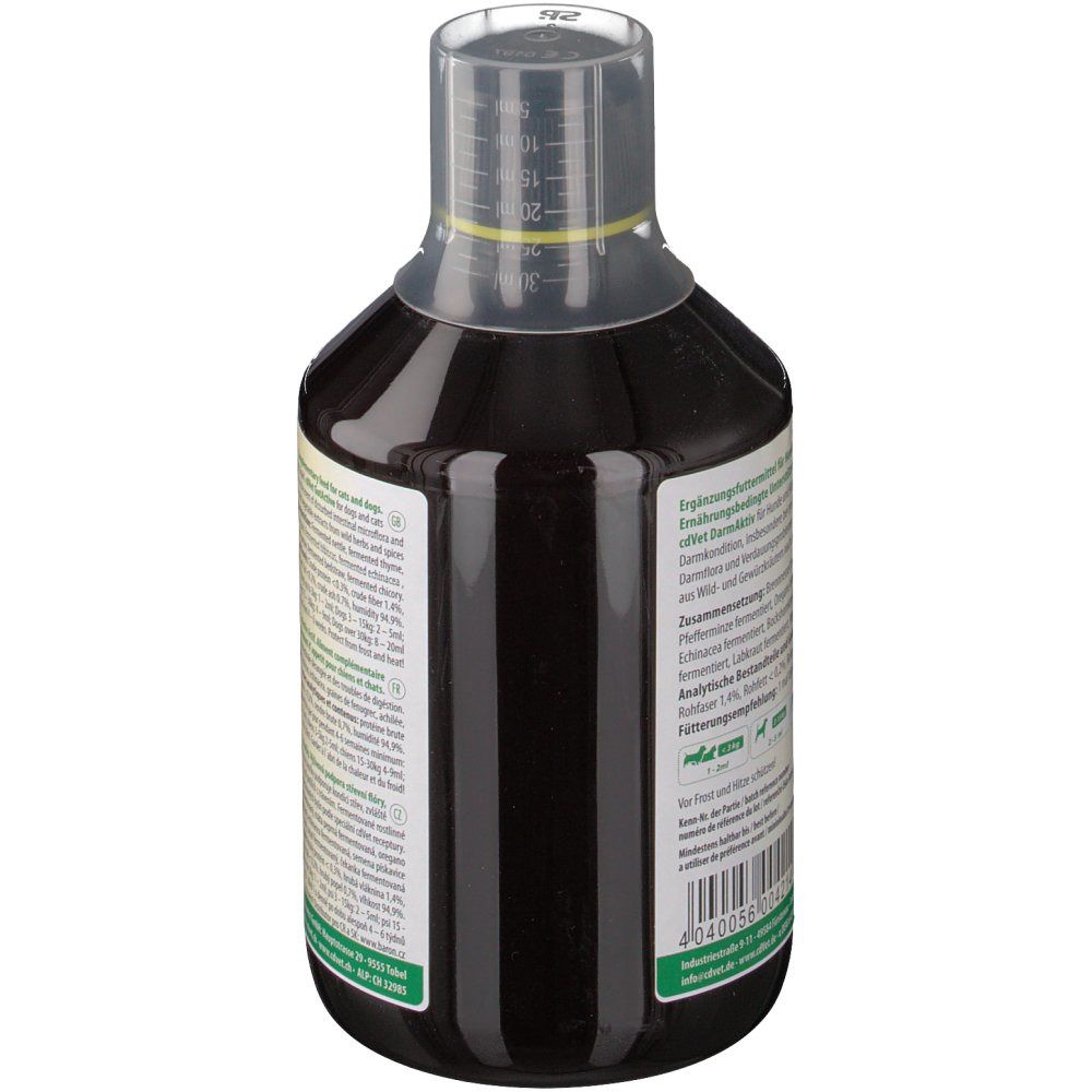 Dos d'une bouteille de liquide brun. Texte en plusieurs langues. Bouchon doseur transparent avec échelle graduée.