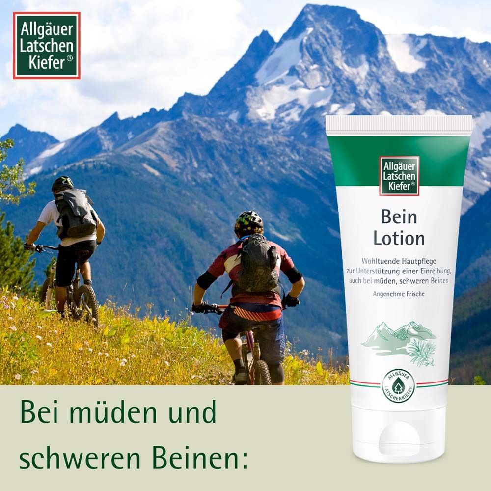Tube de Bein Lotion devant un paysage de montagne. Deux cyclistes. Texte: Pour les jambes fatiguées et lourdes.