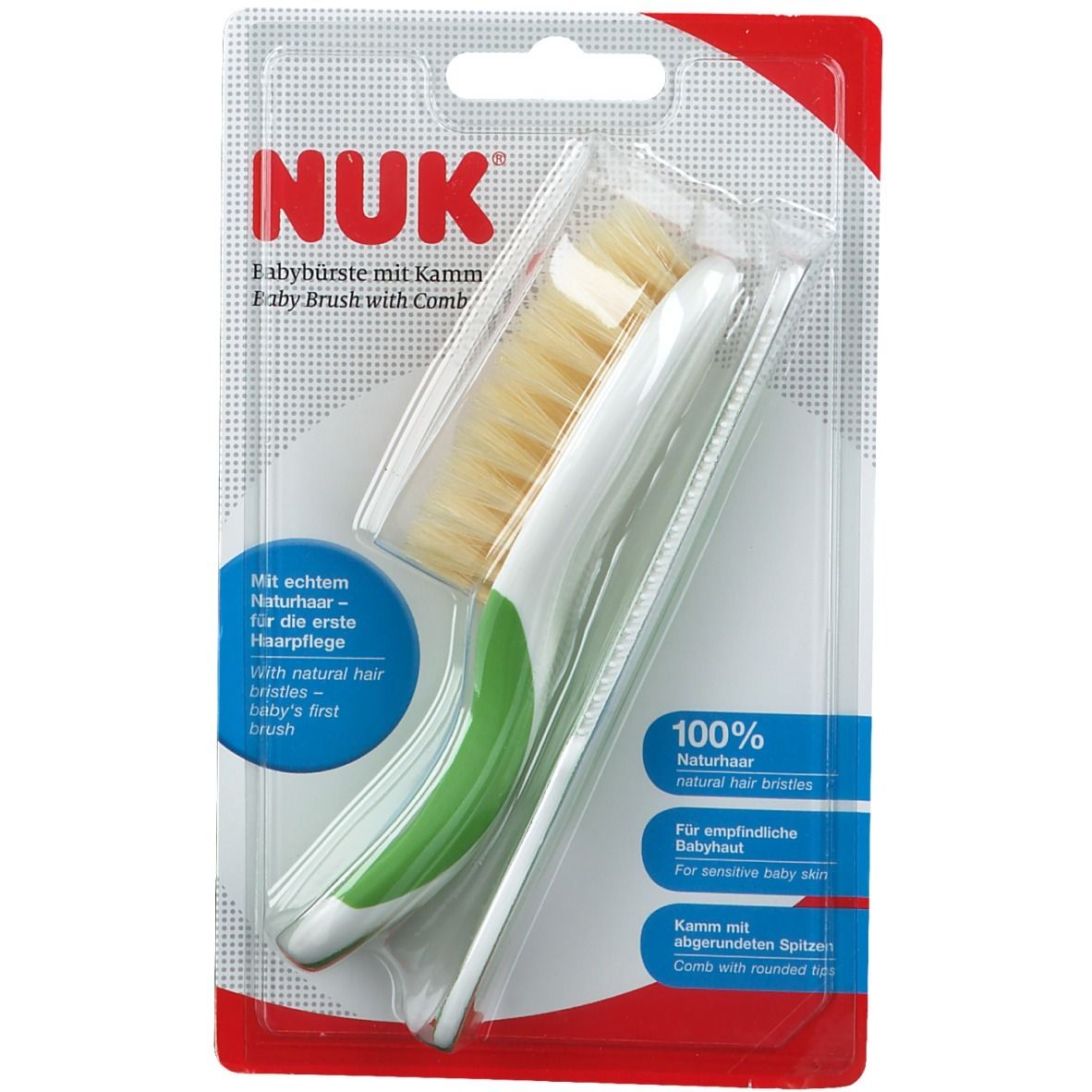 Emballage avec brosse et peigne pour bébé. Brosse avec poils naturels. Texte: NUK, Baby Brush with Comb.