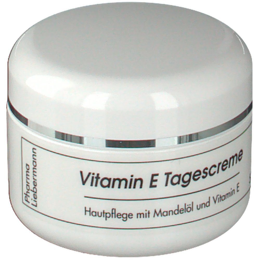 Pot blanc avec couvercle. Inscription : Vitamin E Tagescreme, soin de la peau à l'huile d'amande et à la vitamine E. Pharma Liebermann.