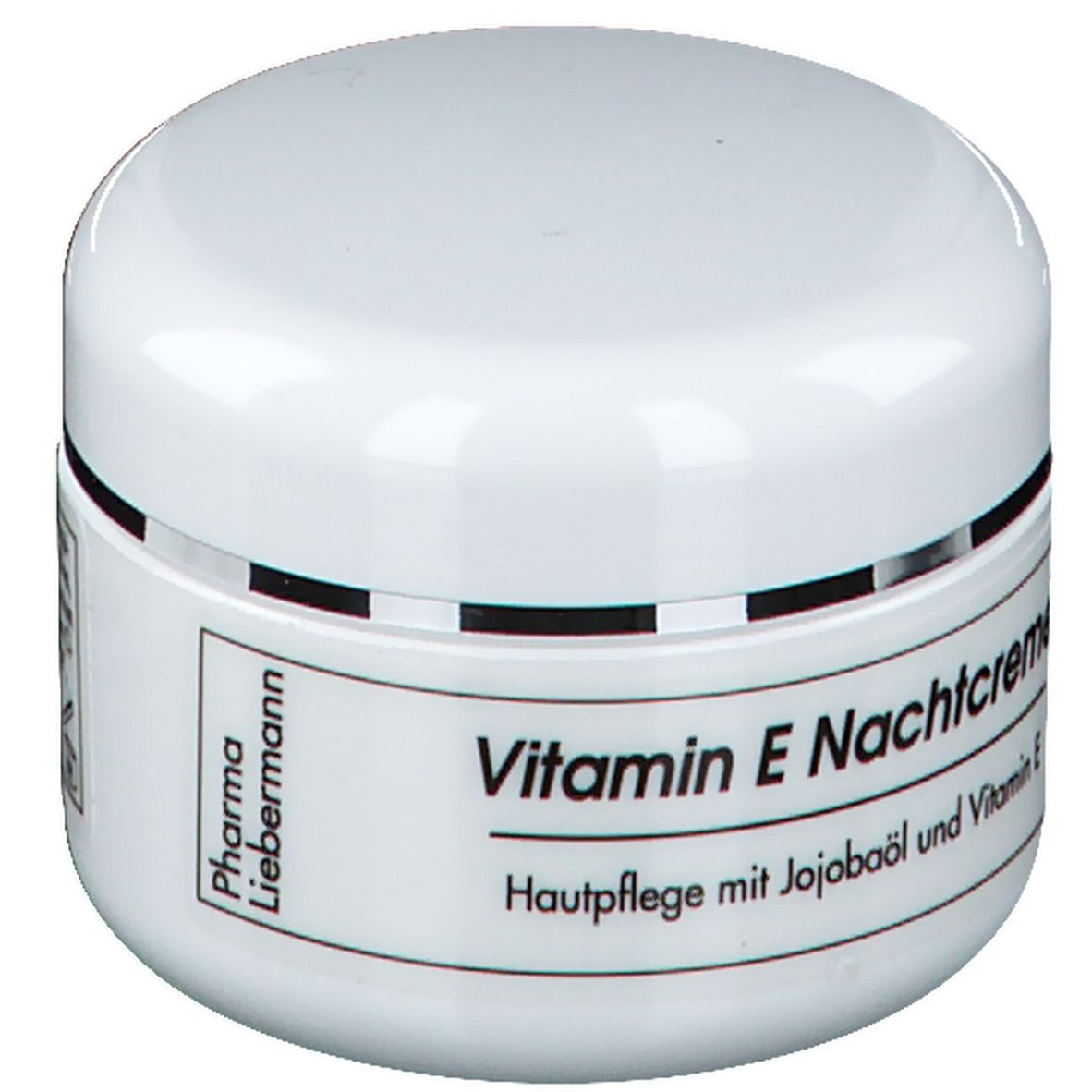 Weißes Tiegel mit "Vitamin E Nachtcreme". Aufschrift: Hautpflege mit Jojobaöl und Vitamin E. Marke: Pharma Liebermann.