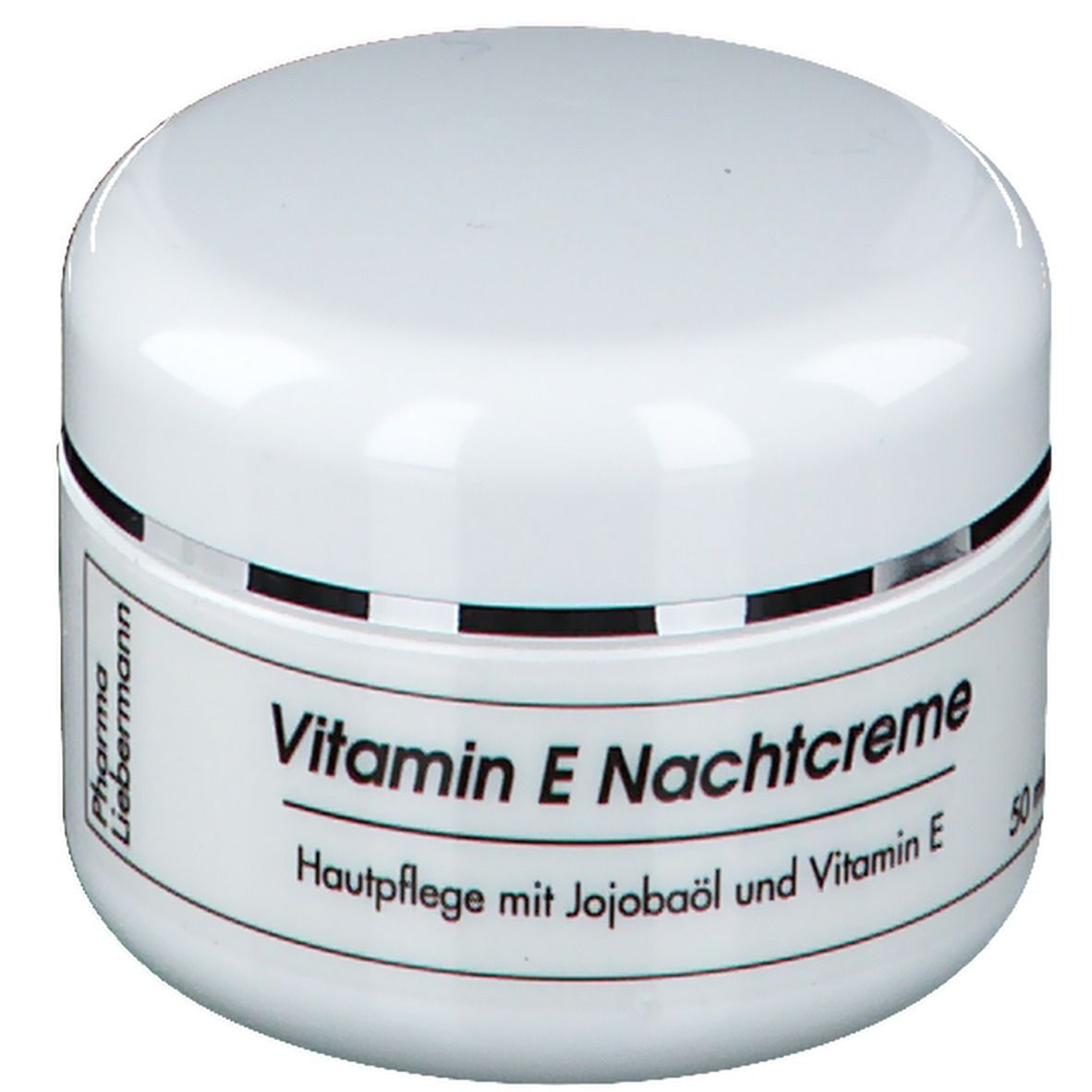 Weißes Tiegel mit "Vitamin E Nachtcreme". Aufschrift: Hautpflege mit Jojobaöl und Vitamin E. Marke: Pharma Liebermann.
