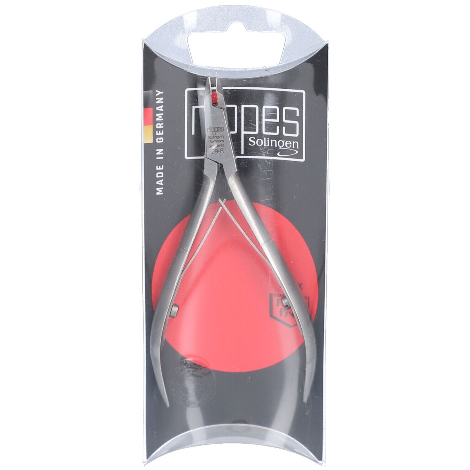 Hautzange rostfrei Nr. 29R in Verpackung. Metall, silberfarben. Roter Kreis im Hintergrund. Made in Germany.