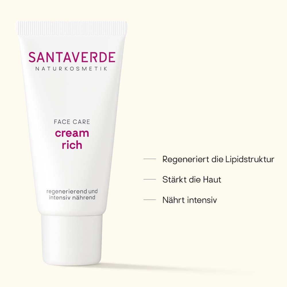 Tube blanche avec logo SANTAVERDE. Soin visage crème riche. Texte: Régénère la structure lipidique, renforce la peau, nourrit intensément.