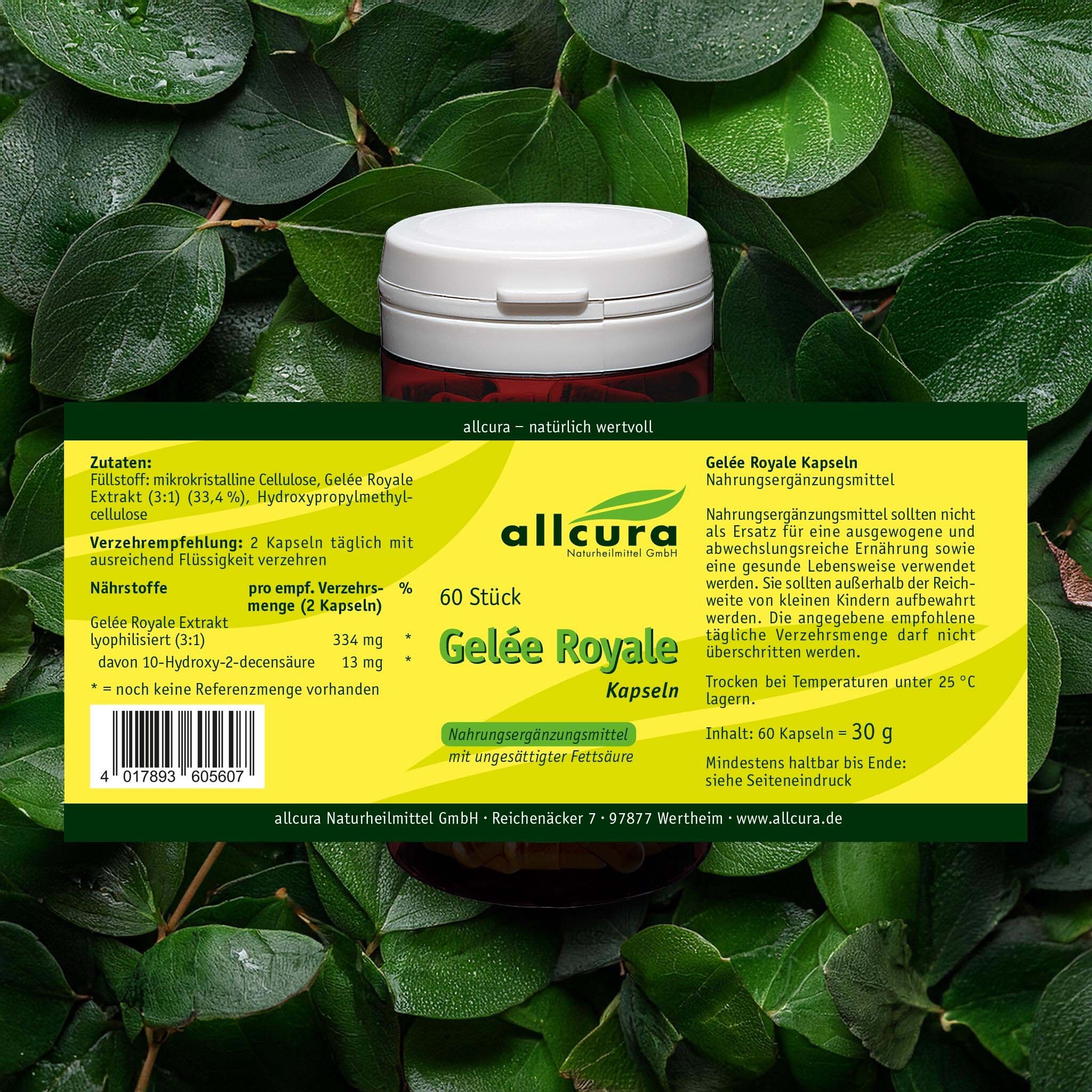 Boîte allcura Gelée Royale Kapseln dans les feuilles. Inscription : 60 pièces. Texte : Complément alimentaire.