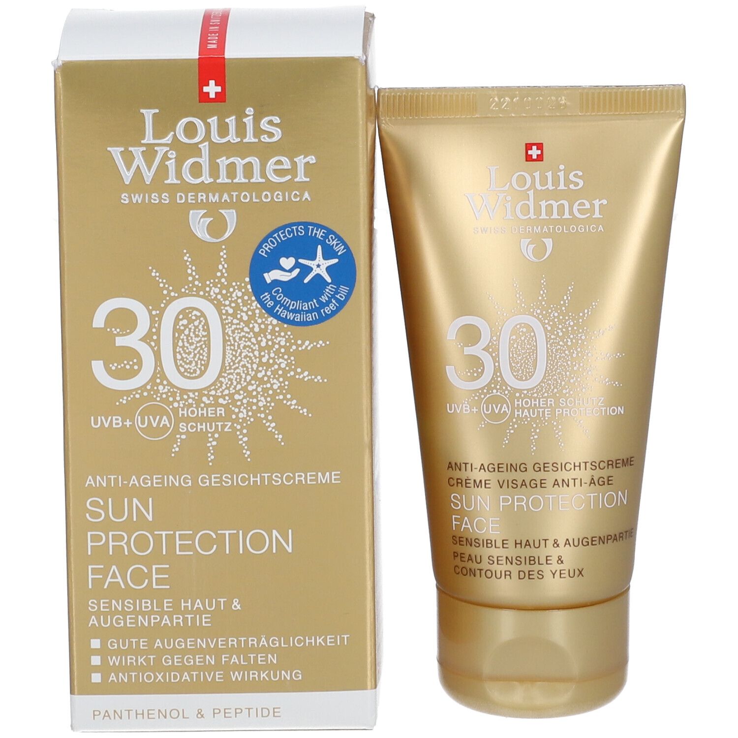 Emballage et tube. Emballage: blanc avec éléments dorés. Tube: doré. Inscription: 30, Sun Protection Face.