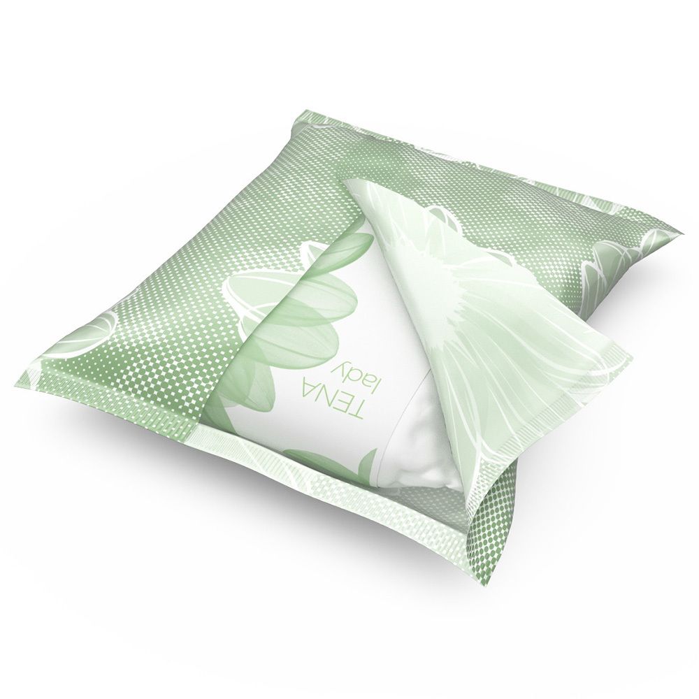 Geöffnete Verpackung mit einem einzelnen Inkontinenzprodukt. Produkt in weißer Einzelverpackung. Grüne Verpackung.