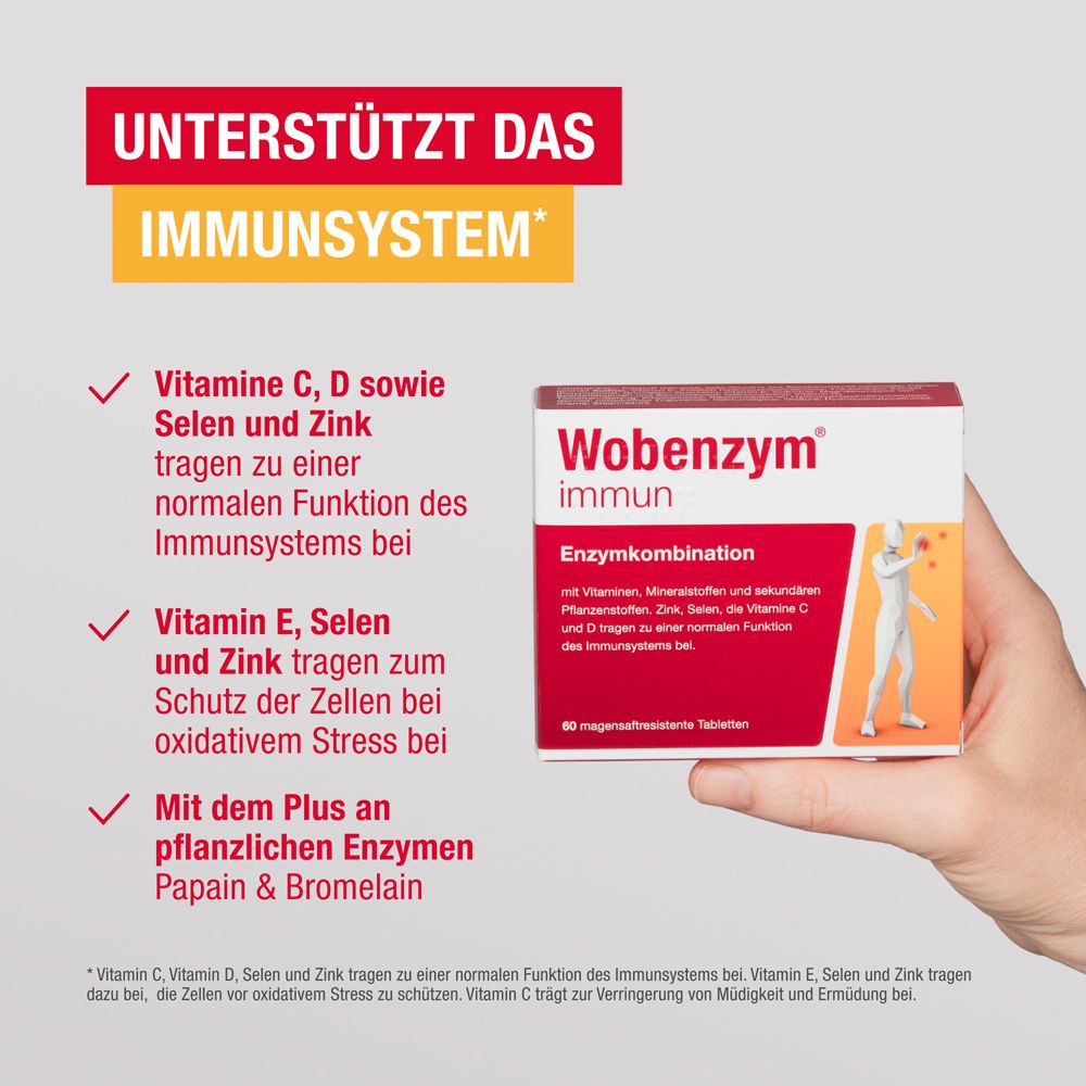 Main tenant l'emballage de Wobenzym® immun. Texte : Soutient le système immunitaire. Contient vitamines, sélénium et zinc.