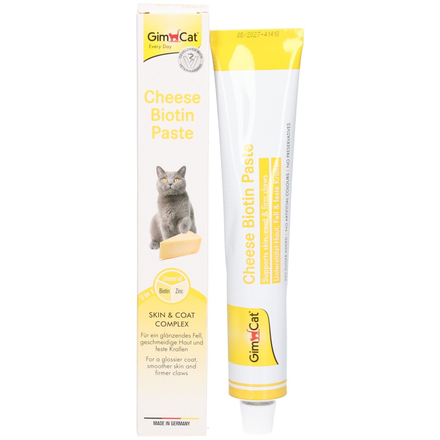 Verpackung und Tube mit Käse-Biotin-Paste, Katze und Käseabbildung auf der Schachtel.