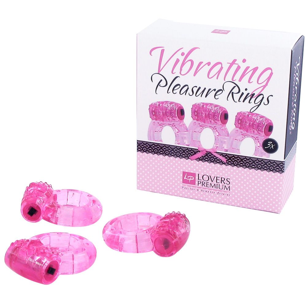 Trois anneaux vibrants roses, avec emballage. Inscription: Vibrating Pleasure Rings, 3x. Marque: Lovers Premium.