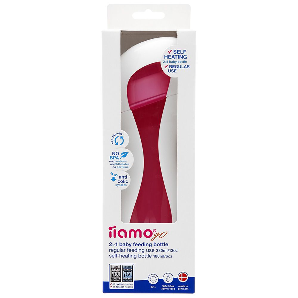 Emballage avec biberon. Bouteille blanche et rose. Texte : 'iiamo go', '2-en-1 biberon', 'anti colic'.