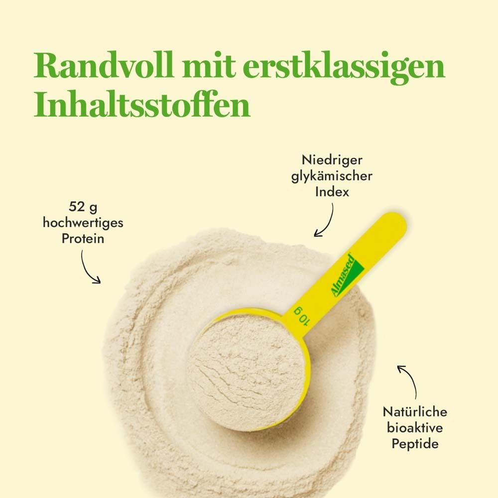 Dunkle Glasflasche mit grünem Deckel. Etikett mit Produktname und Kürbis-Illustration.
