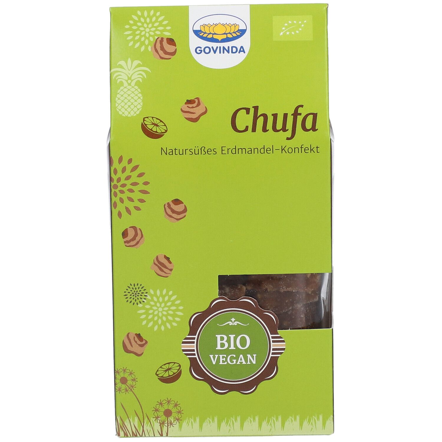 Emballage vert avec logo "Govinda", inscription "Chufa" et label "Bio Vegan". Fenêtre montrant le confiserie.
