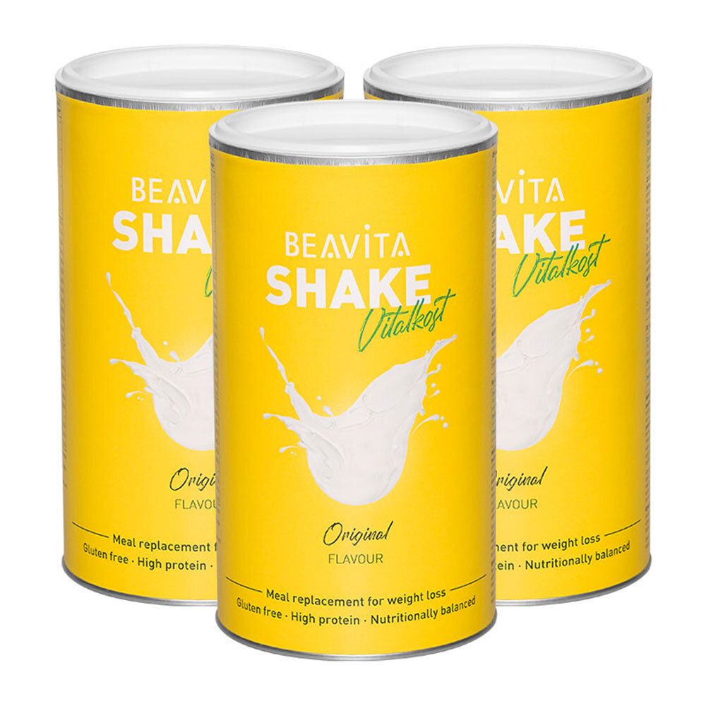 Trois boîtes jaunes BEAVITA Shake Vitalkost Original. Inscription : Original Flavour. Avec motif d'éclaboussure blanche. Couvercles et texte blancs.