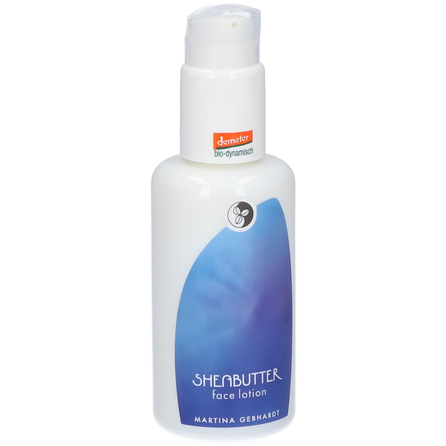 Martina Gebhardt Sheabutter Gesichtsmilch in weißer Spenderflasche mit blauem Etikett.